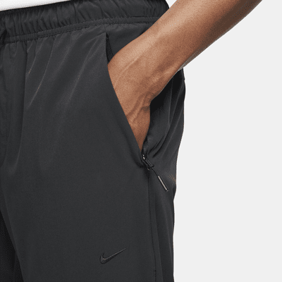 Nike UnlimitedVielseitige Dri-FIT Hose mit Reißverschluss am Bündchen für Herren Kostenloser Versand